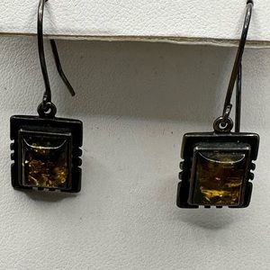 Green amber stones set in 925 sterling silver pierced earrings
